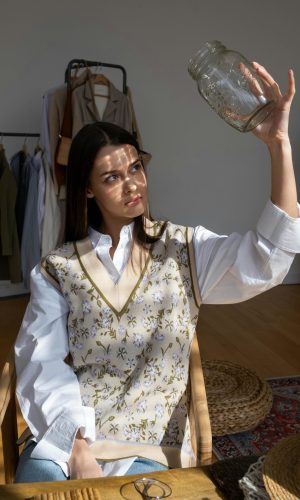 Woman Holding a Jar